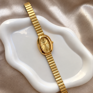 Reloj Ovalado dorado